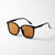 Damen stilvolle quadratische Sonnenbrille mit klarem Rahmen und polarisierten Gläsern Karnz