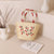 Damen Handgefertigte Korbtasche mit floralem Stickdesign Karnz