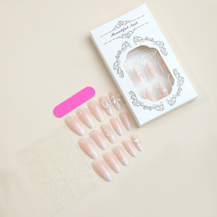 Elegantes Press-On-Nagelset mit dekorativen floralen Akzenten Karnz