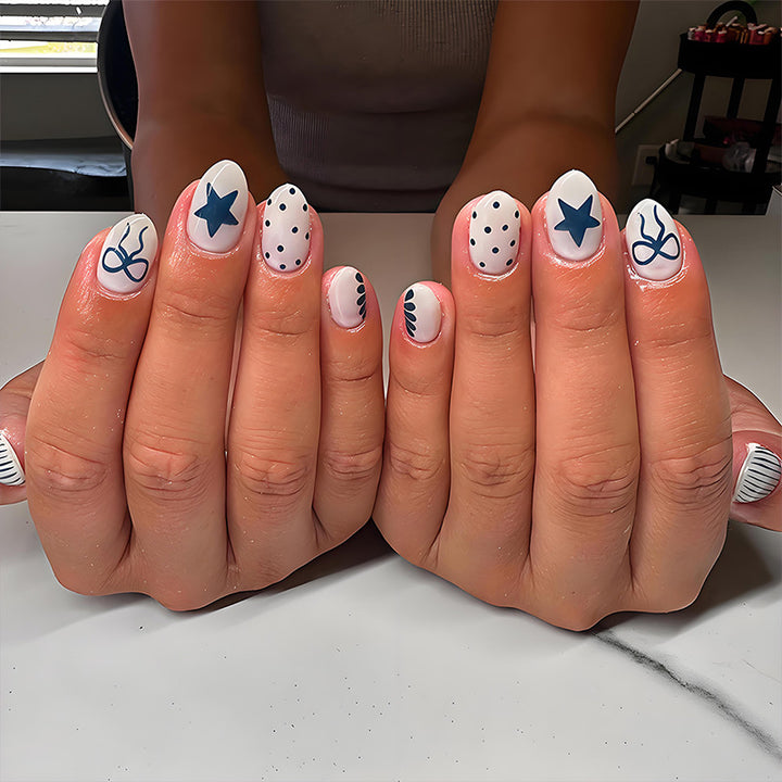Kunstnagelset mit modernen grafischen Mustern und stilvollen Akzenten Karnz