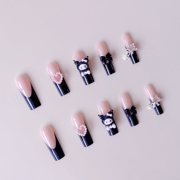 Kunstnagelset mit verspielten 3D-Motiven Karnz
