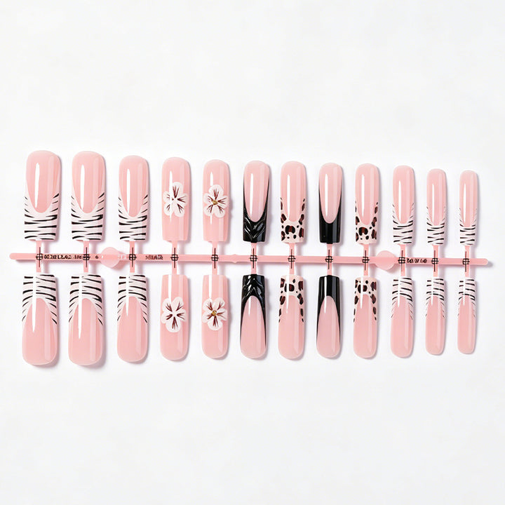 Kunstnagelset mit extravaganten Blumen- und Tierdesigns Karnz