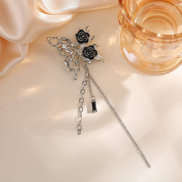 Elegante Brosche mit Blumen- und Kettenmotiv Karnz