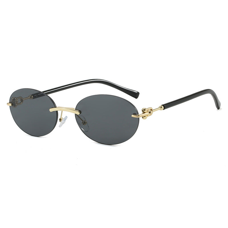 Damen ovale Sonnenbrille mit luxuriösem Metallrahmen und verspiegelten Gläsern Karnz