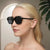 Damen stylische Sonnenbrille mit markantem Design Karnz