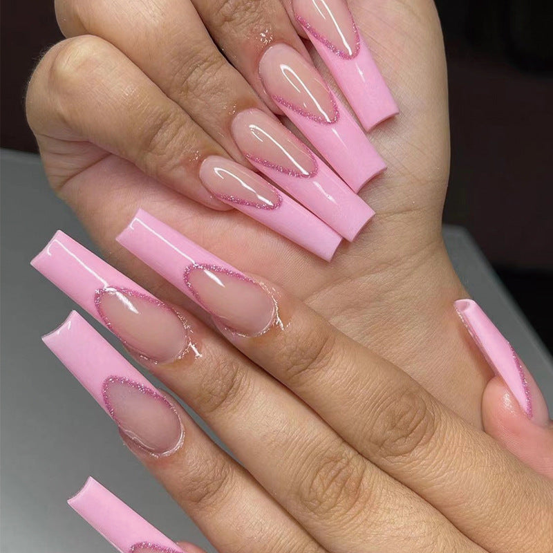 Künstliche Nagelverlängerungen mit Glitzer-Verzierung Karnz