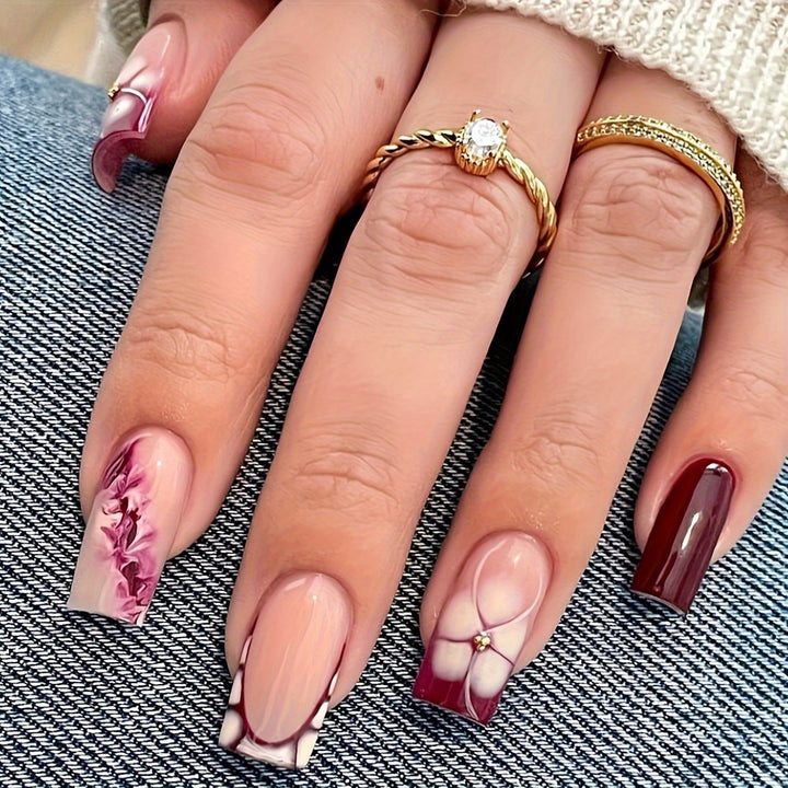 Künstlerische Gel-Nagelverlängerungen mit floralem Design Karnz