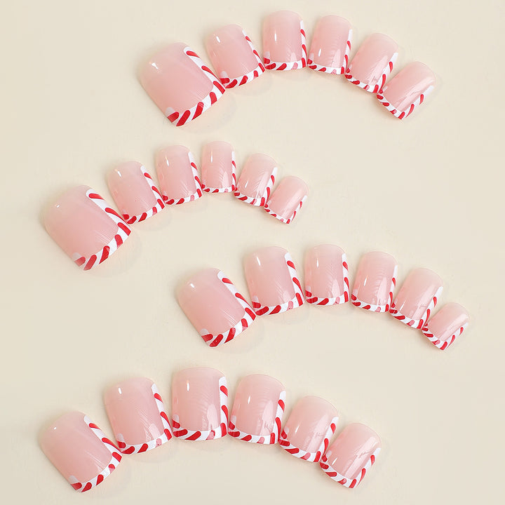 Kreatives Kunstnagelset mit festlichem Zuckerstangen-Design Karnz