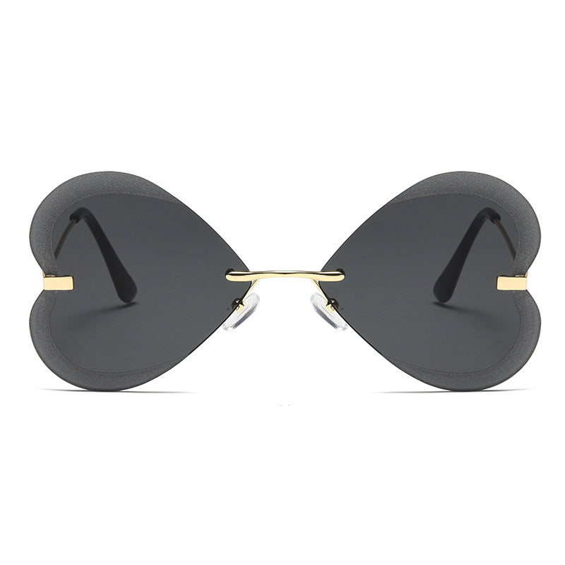 Damen Herzförmige Sonnenbrille im trendigen Design Karnz