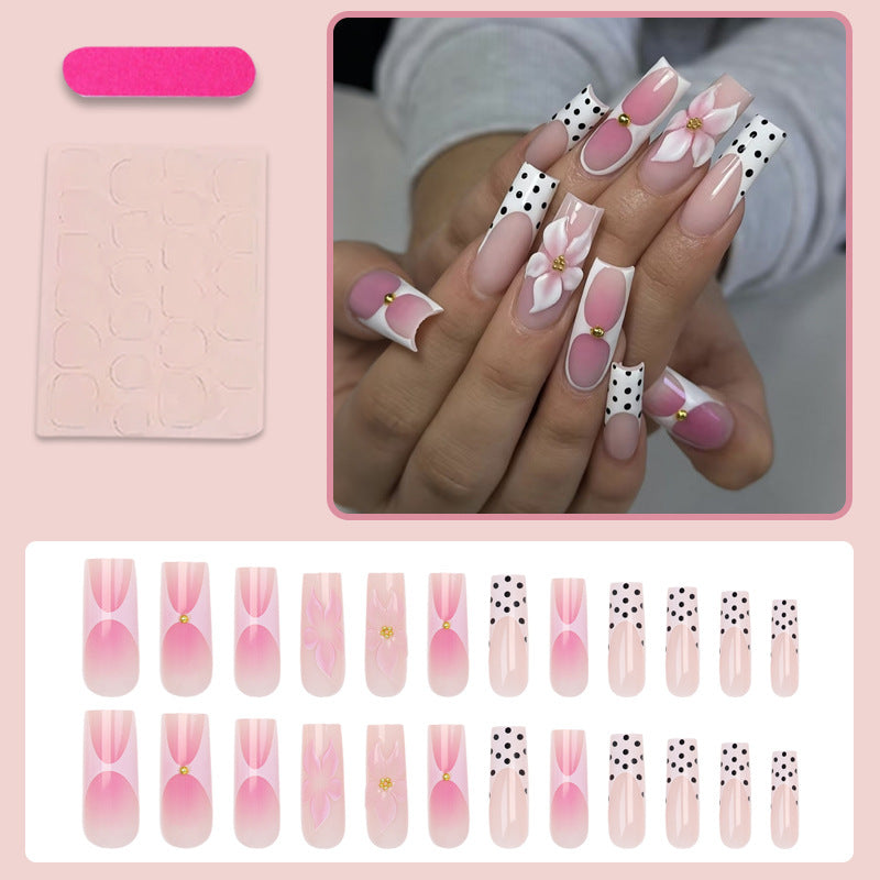 Kunstnagelset mit eleganten Blüten- und Punktmustern Karnz