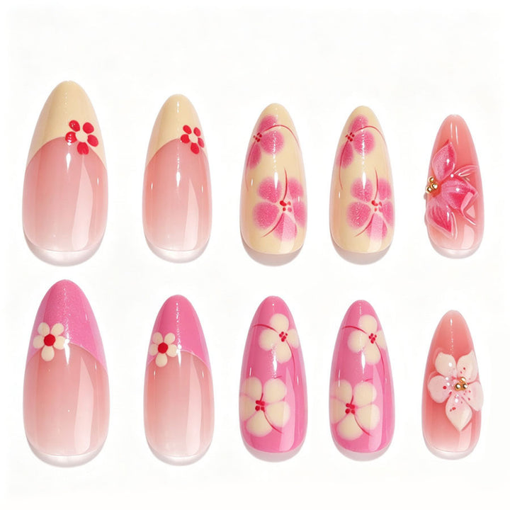 Kunstnagelset mit floralen Akzenten und Glitzerelementen Karnz
