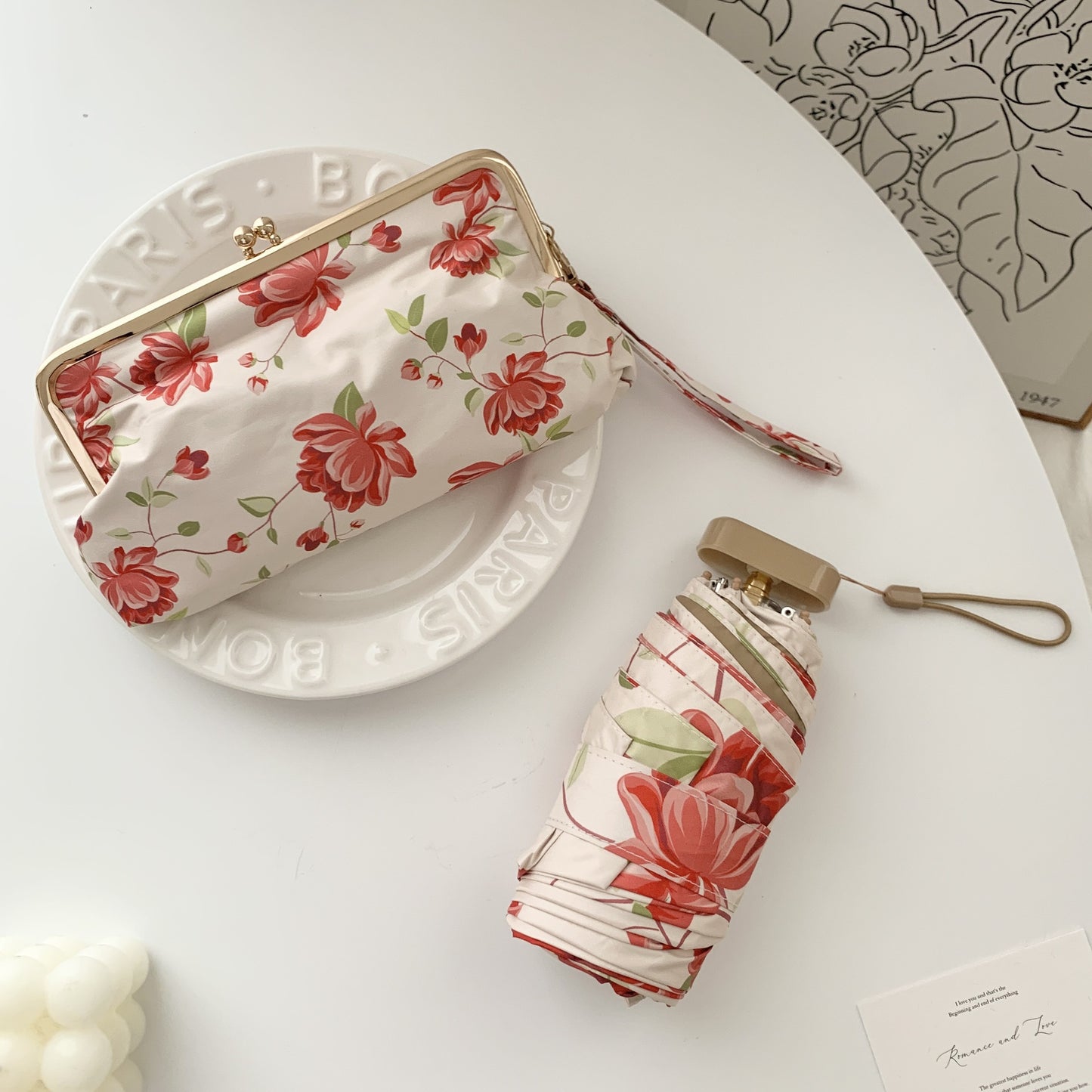 Damen eleganter Faltregenschirm mit floralem Design und praktischem Etui Karnz