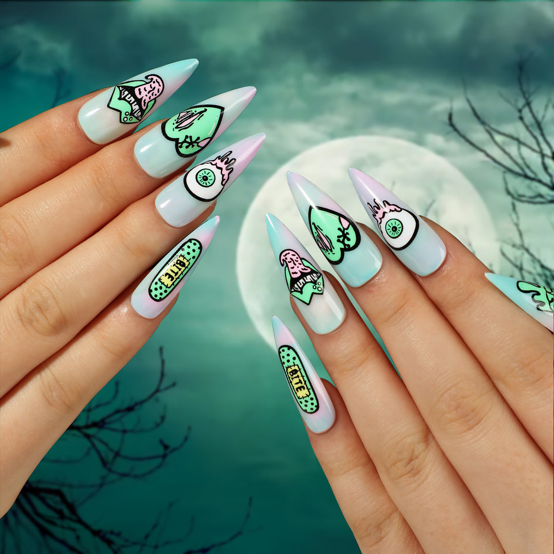 Kunstvolle Stiletto-Nägel mit kreativen Motiven und detailgetreuer Gestaltung Karnz
