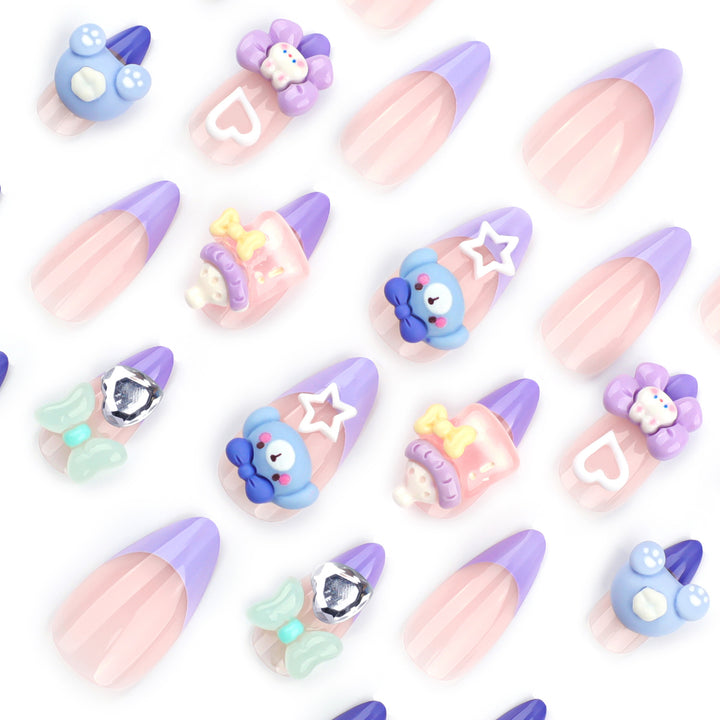 Künstliche Nagelkunst mit verspielten Motiven Karnz