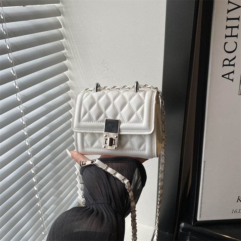 Elegante gesteppte Mini-Umhängetasche
