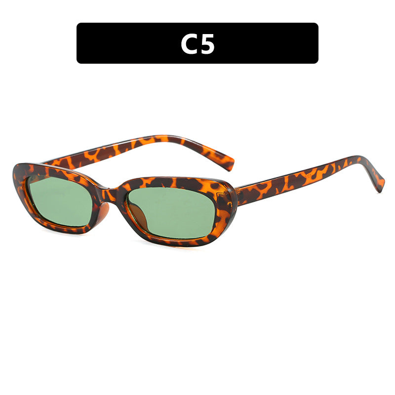 Damen modische Katzenaugen-Sonnenbrille mit transparentem Kunststoffrahmen und UV-Schutz Karnz