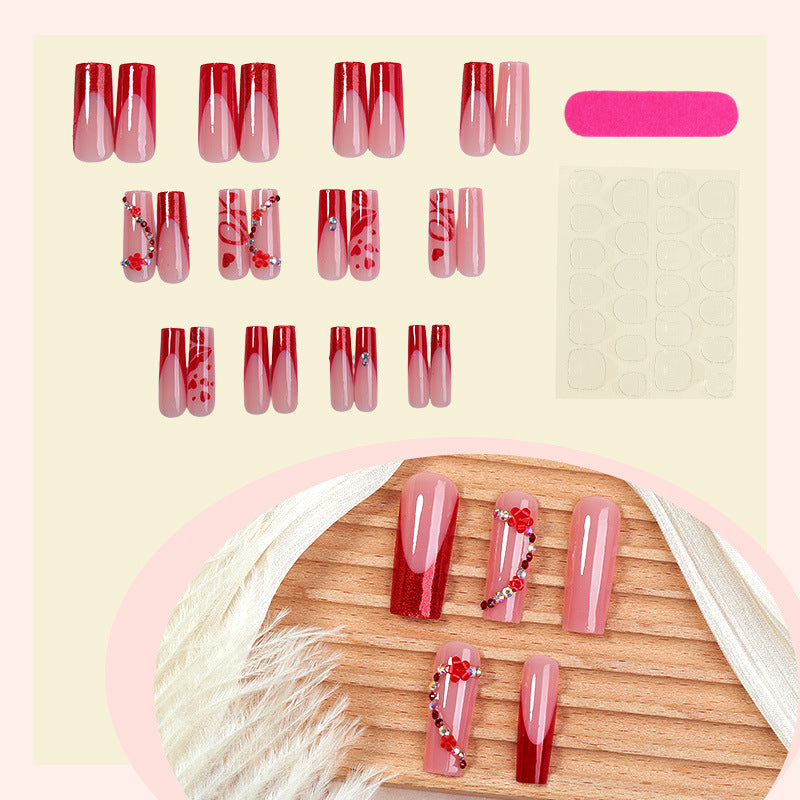 Elegantes Press-On Nagelkunstset mit floralen und Glitzerakzenten Karnz