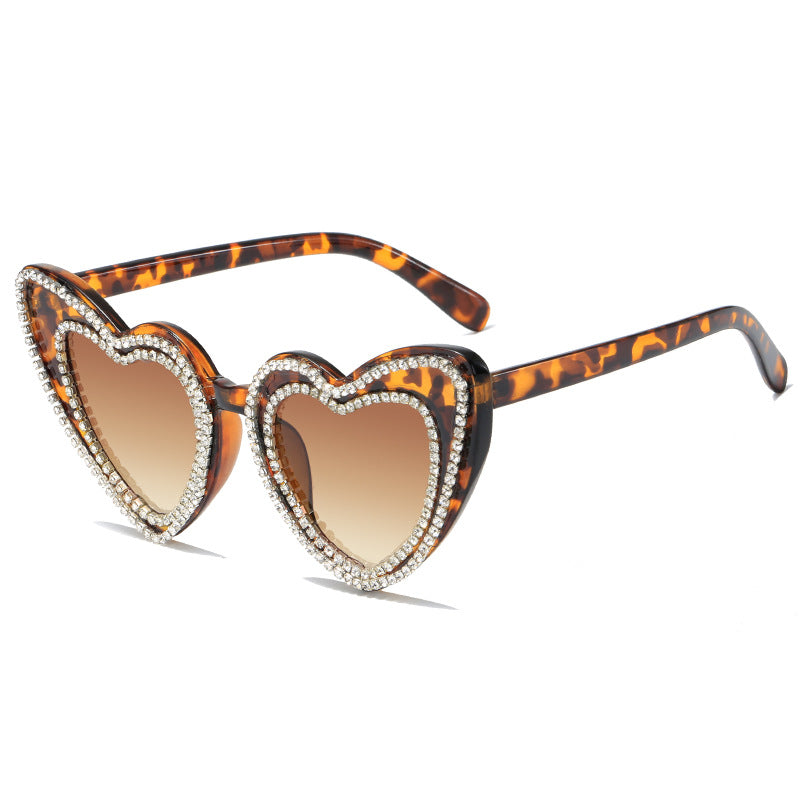 Damen Herzförmige Sonnenbrille mit Glitzerakzenten Karnz