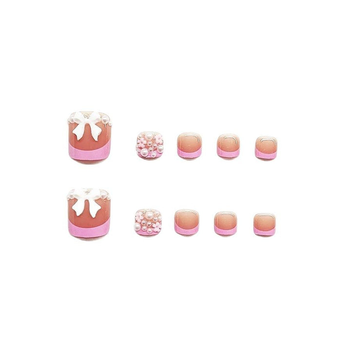 Dekorativer Press-On Nagelkunst Set mit floralen und Schleifenakzenten Karnz