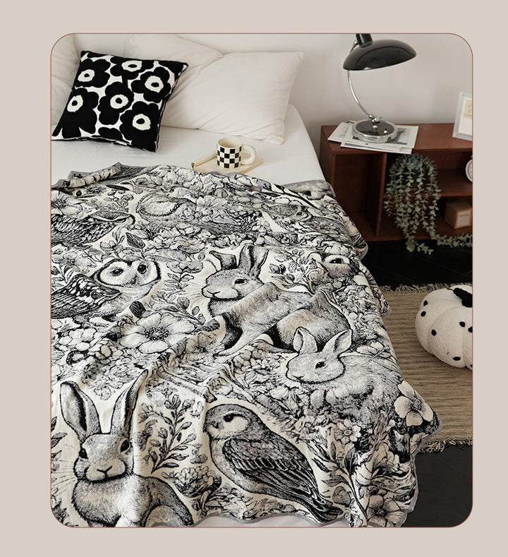 Kuschelige Wohndecke mit detailliertem Jacquard-Tiermotiv