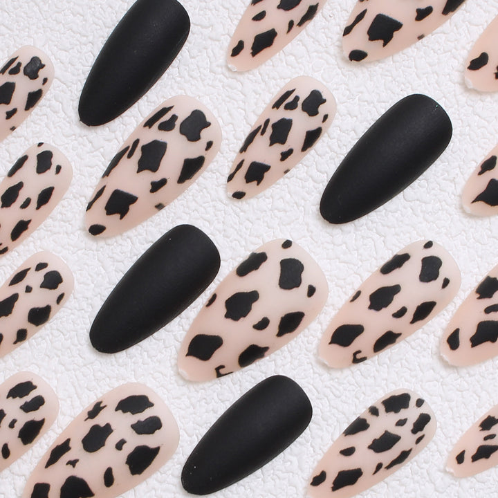 Künstlerische Stiletto Press-On Nägel mit Leoparden Design Karnz