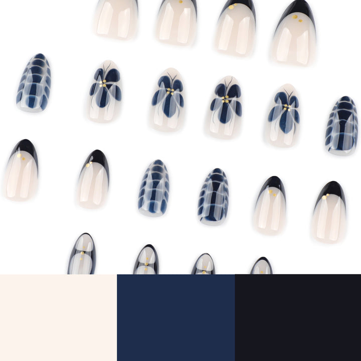 Kunstvolle Nailart im eleganten Stiletto-Design mit floralen Akzenten Karnz