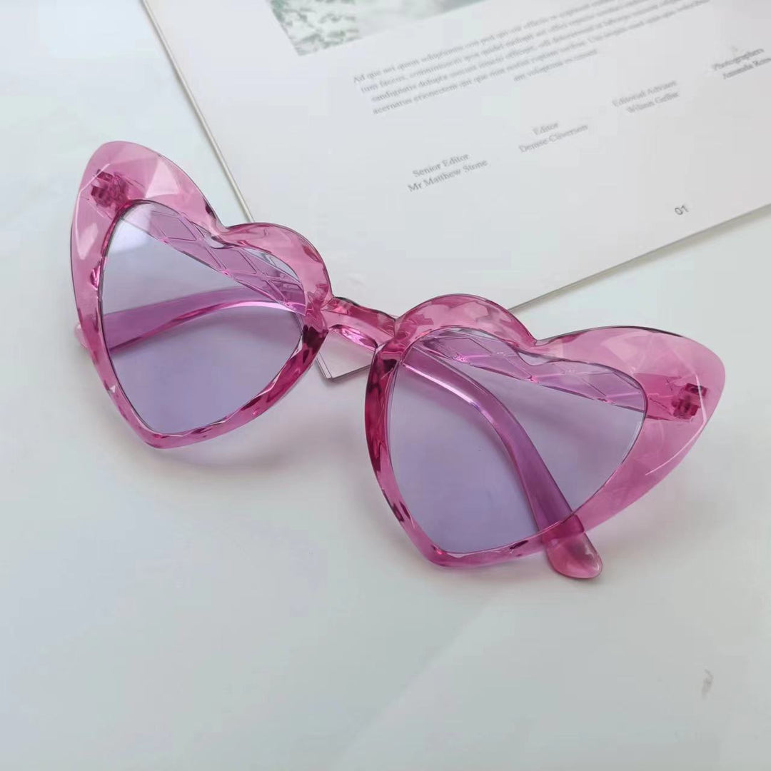 Damen Herzförmige Sonnenbrille mit transparenten Gläsern Karnz