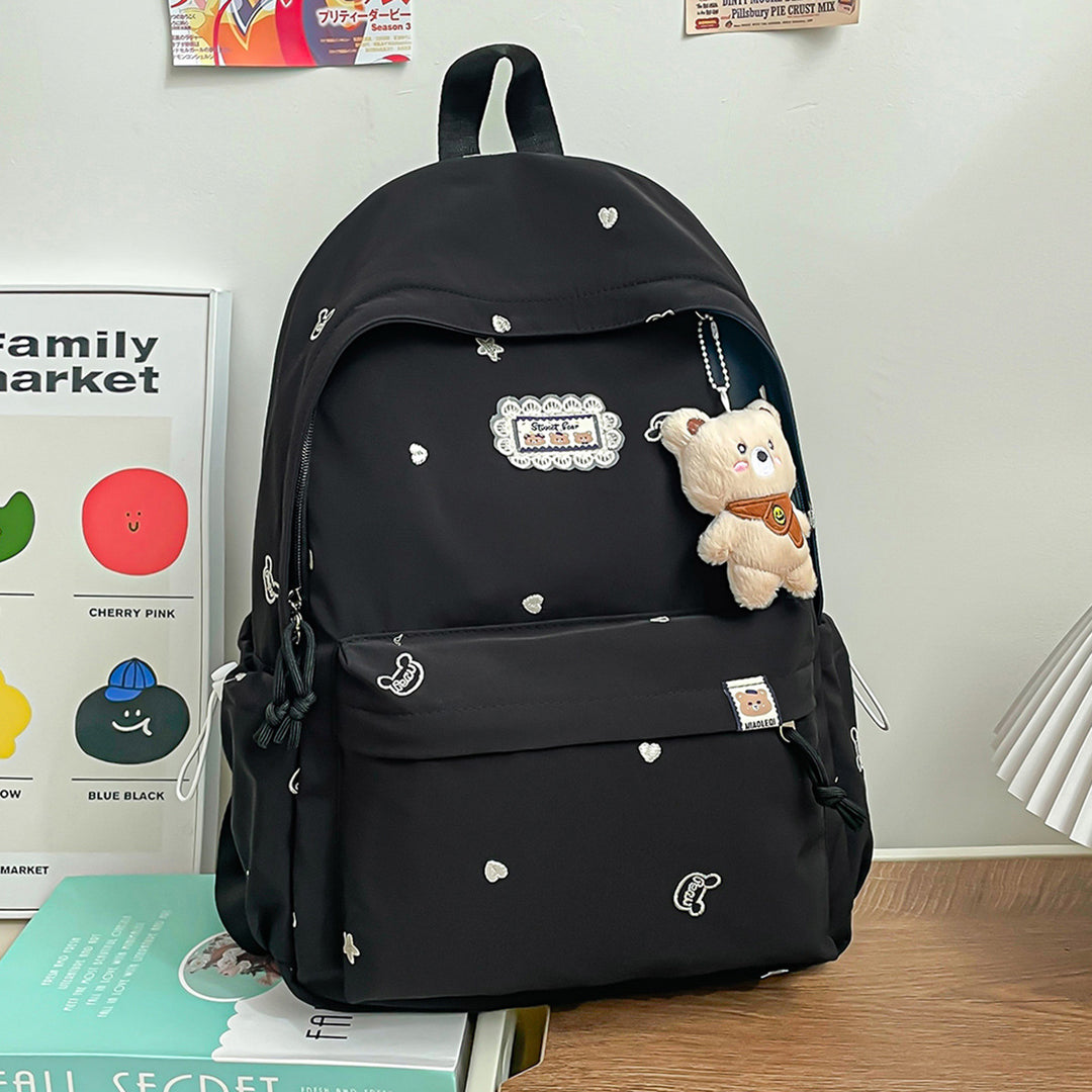 Stylischer backpack mit floralem Schmuck Karnz