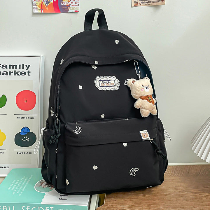 Stylischer backpack mit floralem Schmuck Karnz