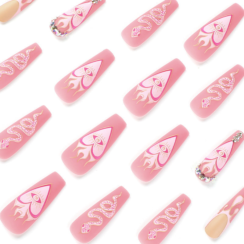 Kunstvolle Nagelverlängerungen mit schlangen- und blumenverzierung Karnz