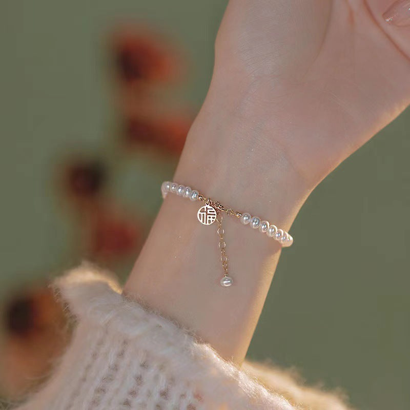 Elegante Perlen Charm Armband Karnz