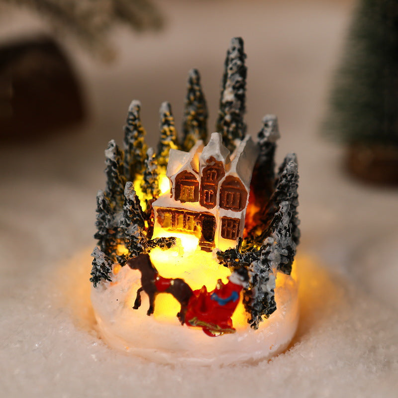Beleuchtete Weihnachtsdorf-Szene Karnz
