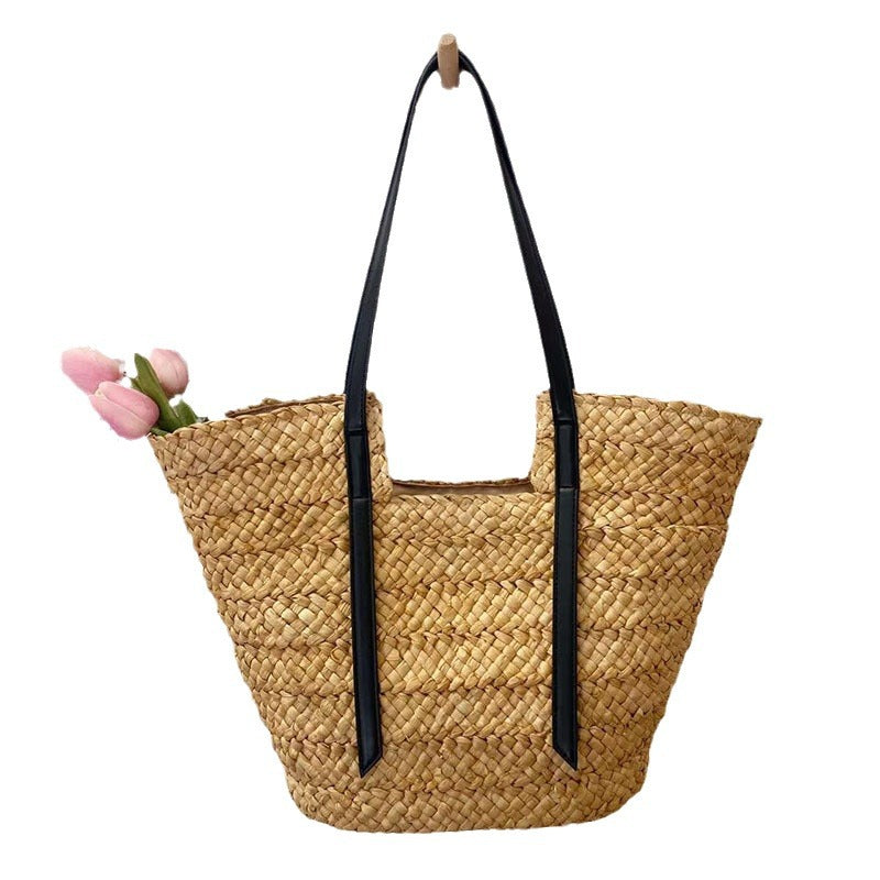 Damen Handtasche aus geflochtenem Naturmaterial mit eleganten Ledergriffen Karnz