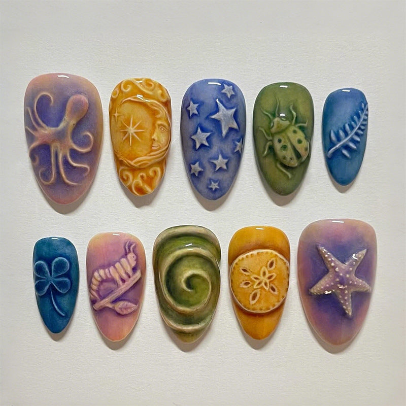 Kunstnagelset mit kreativen maritimen und naturinspirierten Motiven Karnz