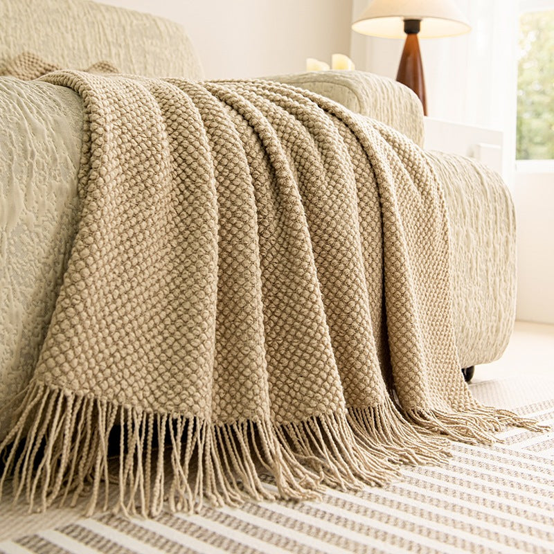Strukturierte Strickwurfdecke