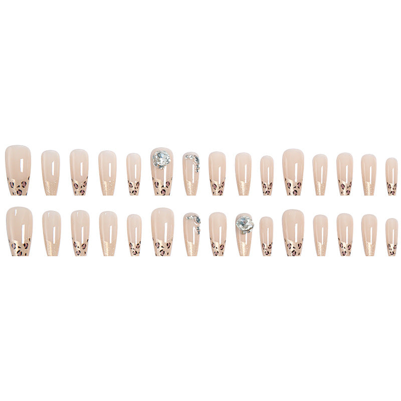 Kunstnagelset mit Glitzer- und Leopardenmotiv Karnz