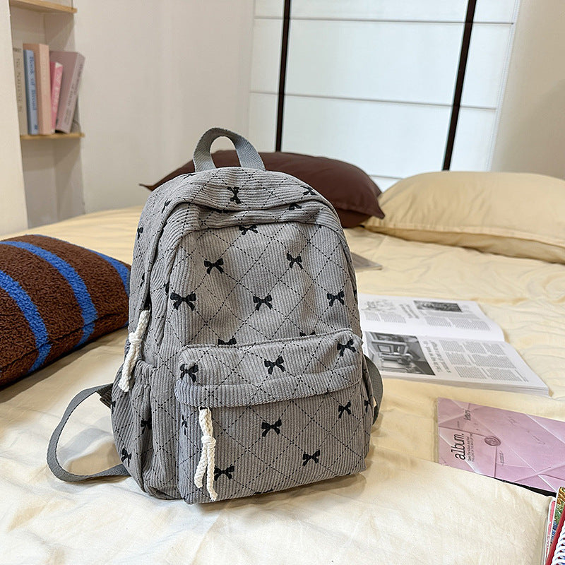 Süßer Mini-Rucksack mit Schleifenmuster