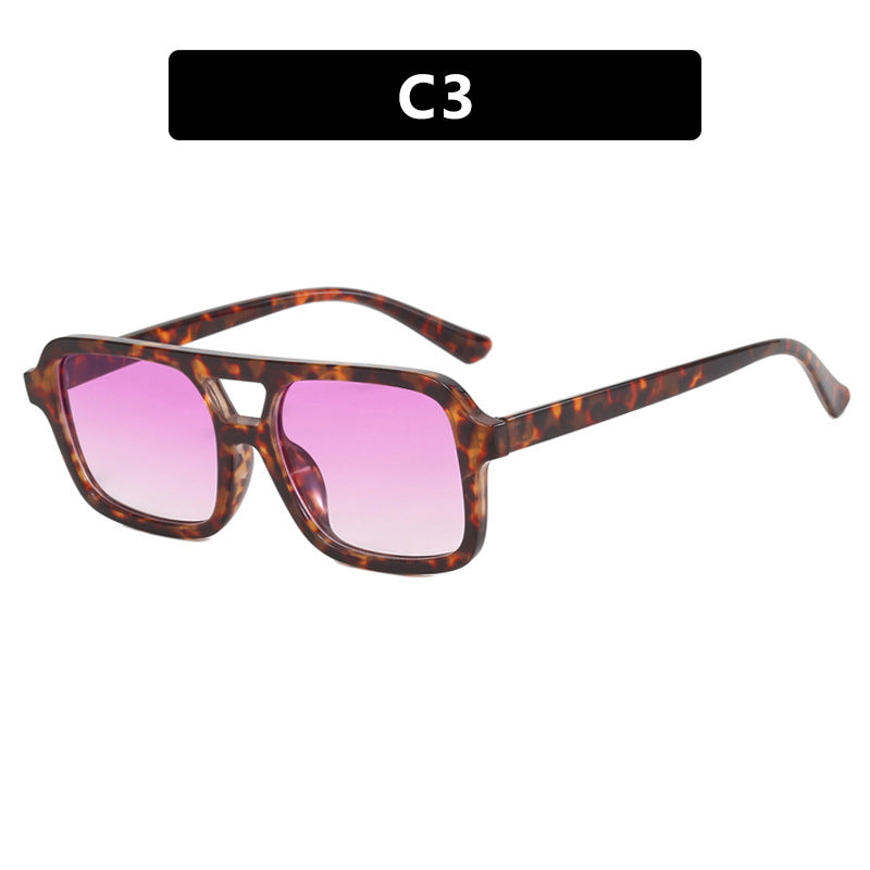 Damen moderne quadratische Sonnenbrille mit schützendem UV-Filter und transparentem Rahmen Karnz