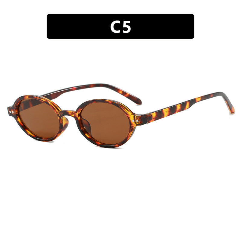 Damen modische ovalförmige Sonnenbrille mit ausgefallenem Rahmen Karnz
