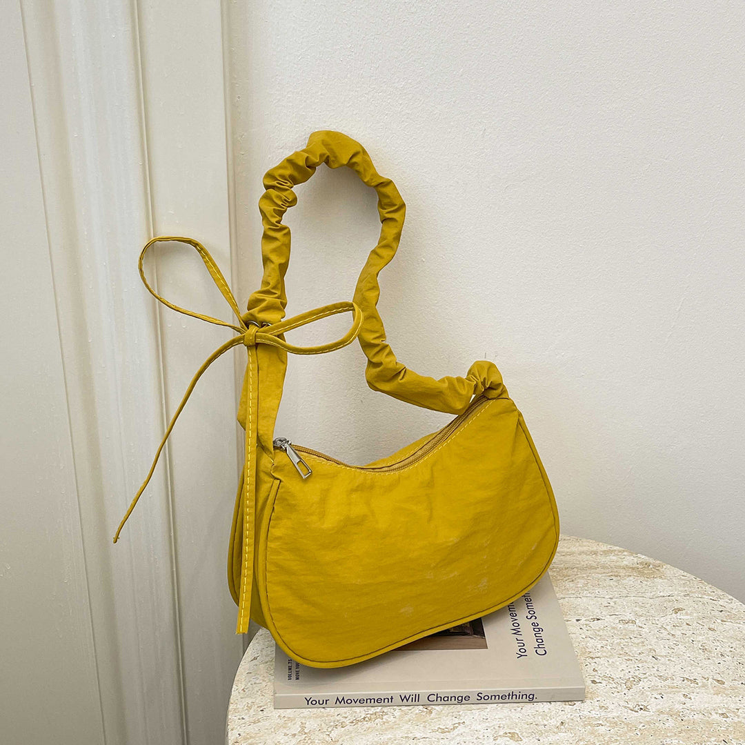 WoTexturiertes Stoff Sling Bag Karnz
