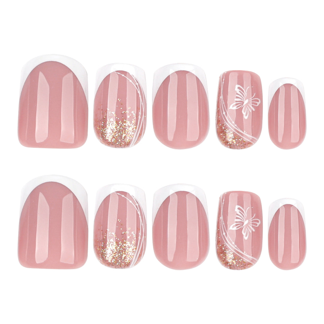Elegante Nagelverlängerungen mit Glitzer und Blumen-Motiven Karnz