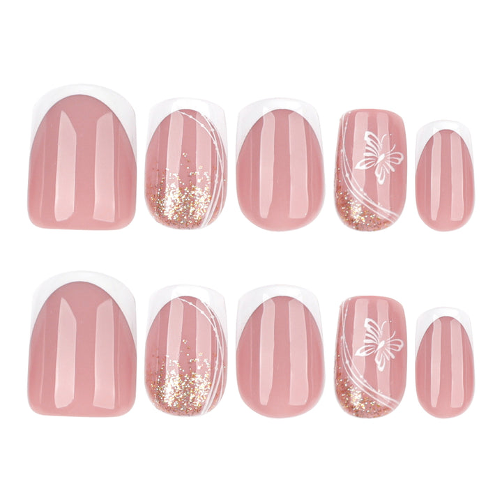 Elegante Nagelverlängerungen mit Glitzer und Blumen-Motiven Karnz