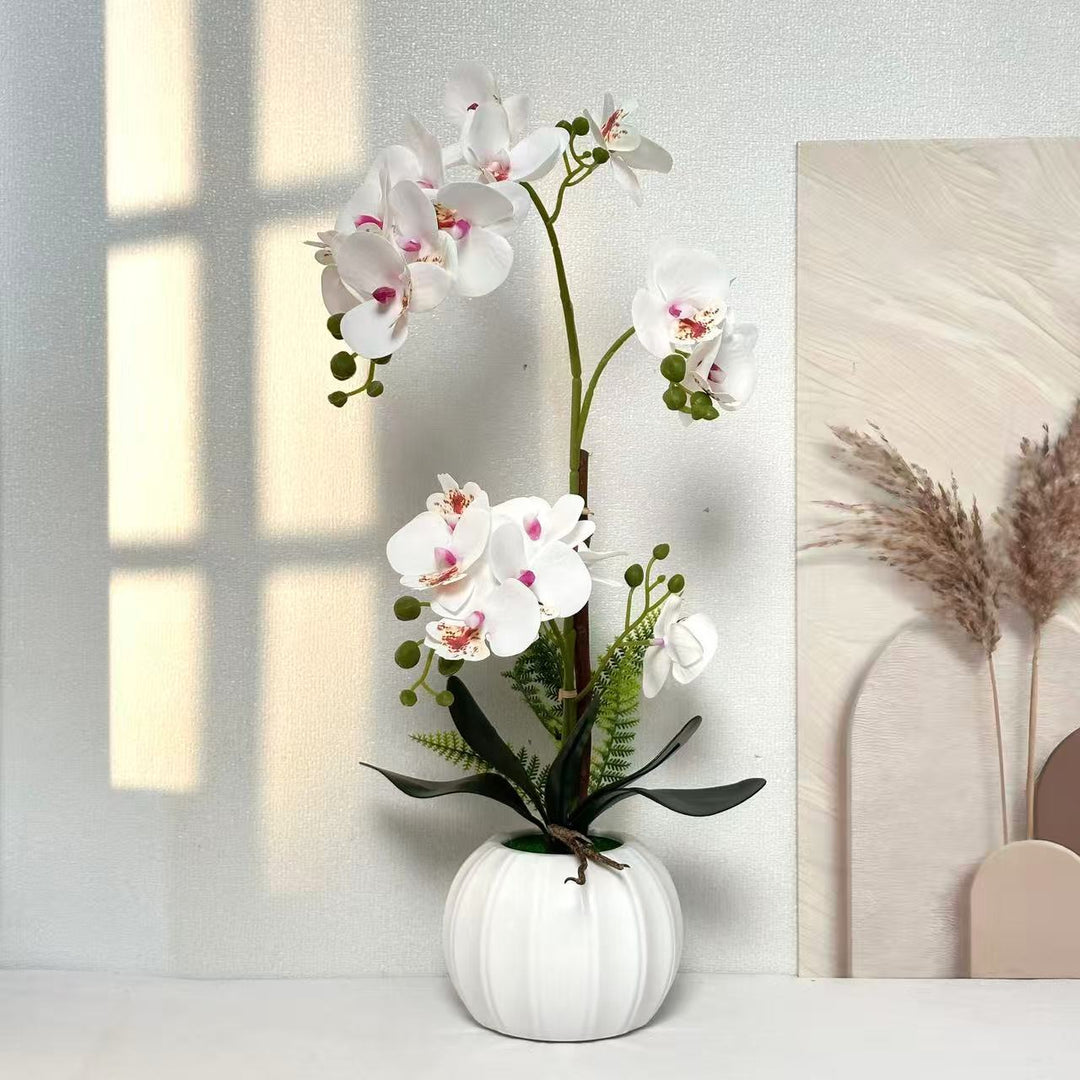 Elegante künstliche Orchideenarrangement für die Innenraumdekoration