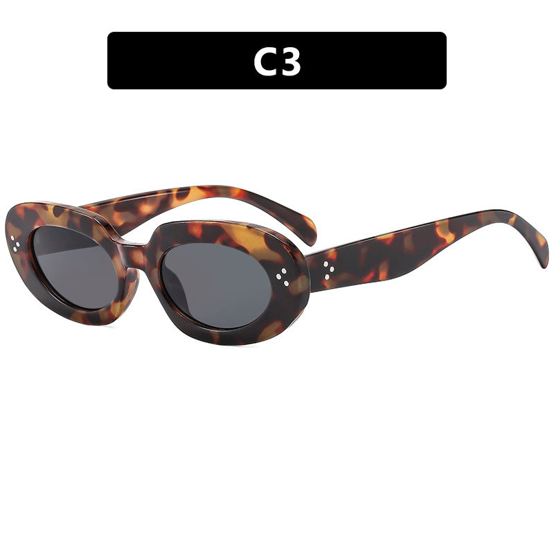 Damen modische Sonnenbrille mit einzigartigem ovalen Rahmen und schützenden Gläsern Karnz