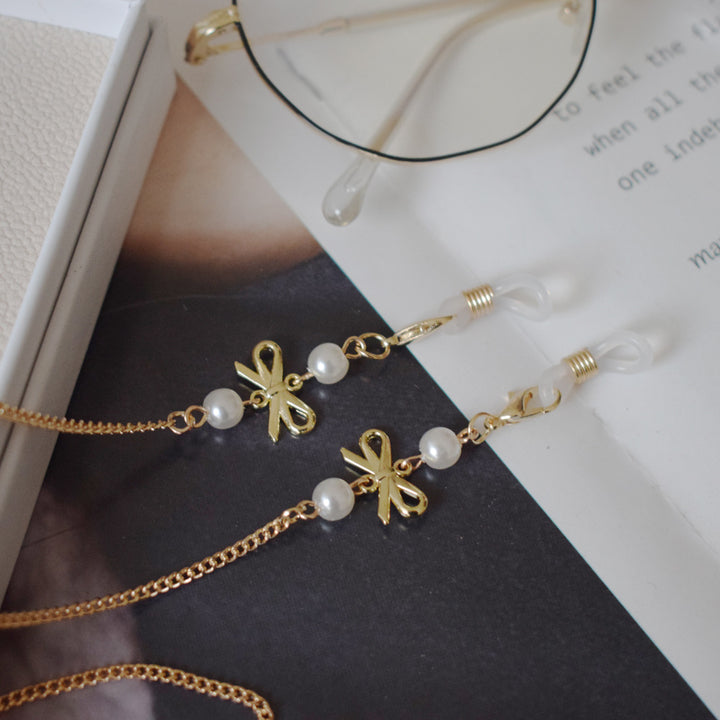 Elegante mit Perlen akzentuierte Brillenketten Karnz 1786692339