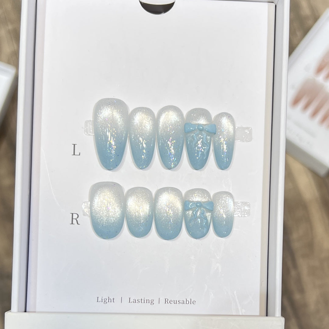 Glänzendes Press-On Nagelkunst-Set mit Schleifenakzenten Karnz
