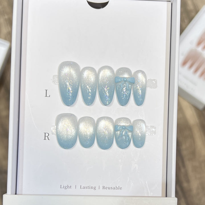 Glänzendes Press-On Nagelkunst-Set mit Schleifenakzenten Karnz