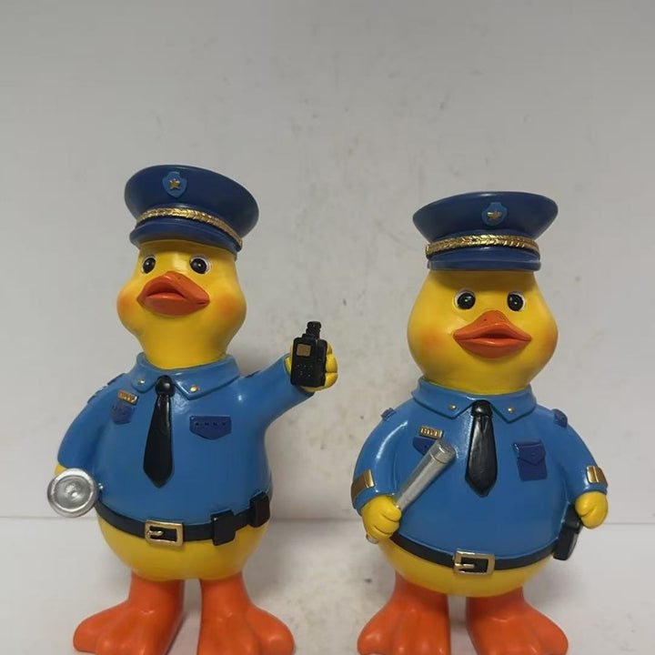 Lustige Polizeientenfigur Karnz