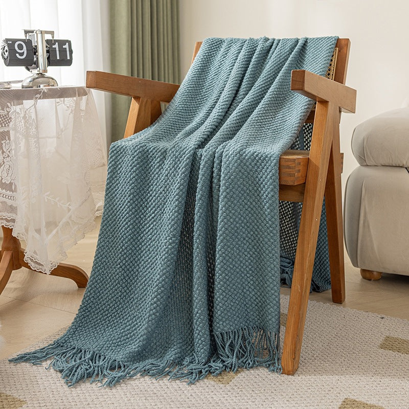 Strukturierte Strickwurfdecke