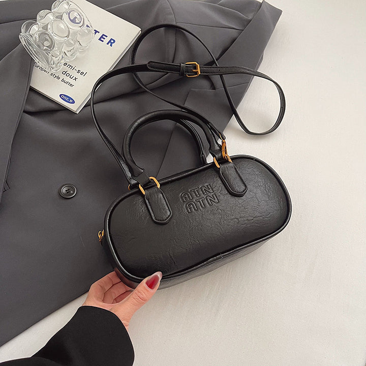 Texturierte Mini-Handtasche Karnz